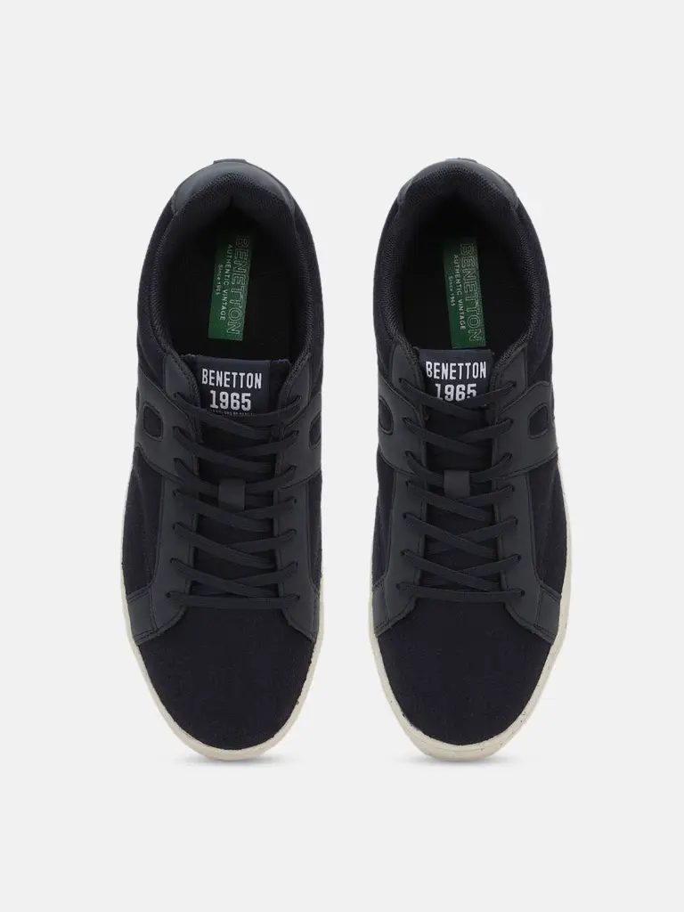7b2f6f31-1584-4ed9-9ea2-ec46f0c113711692625436141UnitedColorsofBenettonMenNavyBlueWovenDesignPUSneakers5.webp