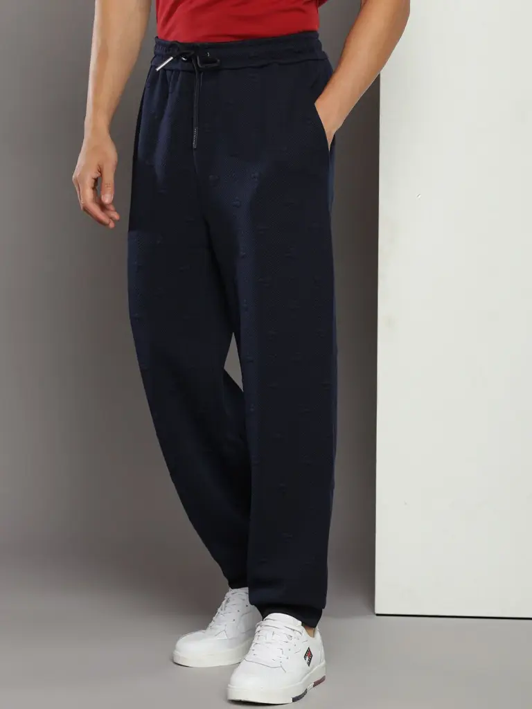 57b7376d-4221-4add-8fe5-1922c1fb6df61689169731193TommyHilfigerMenTrackpant3.webp