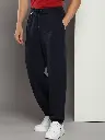 57b7376d-4221-4add-8fe5-1922c1fb6df61689169731193TommyHilfigerMenTrackpant3.webp